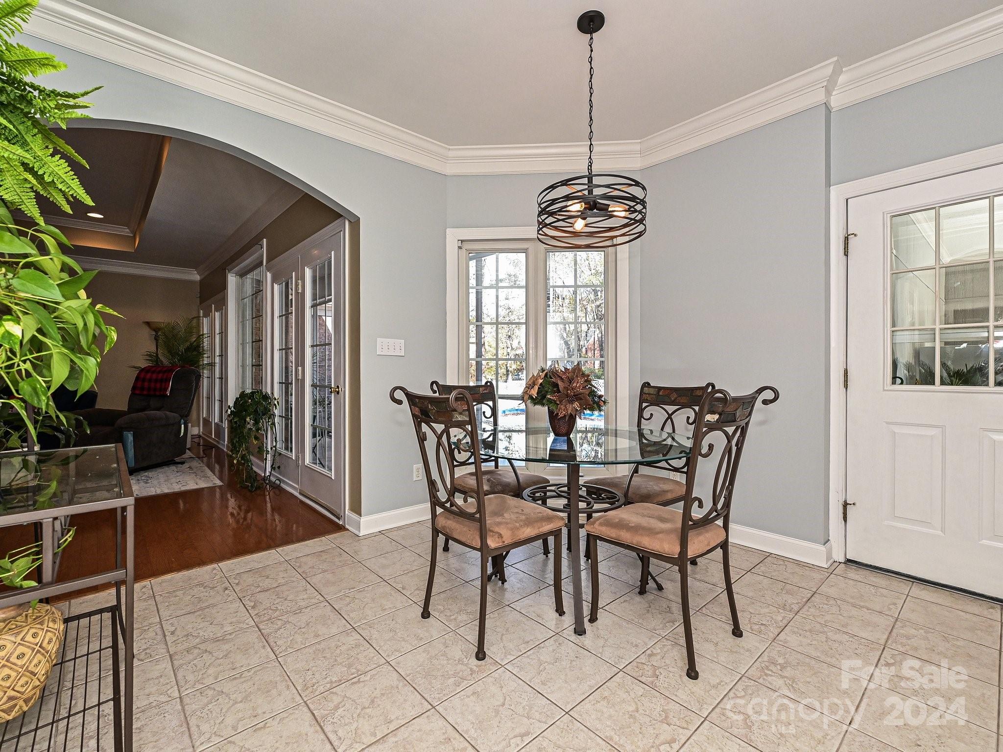 3203 Bentley Drive Lancaster, SC 29720 - Photo 18 of 45 a dining room with furniture window and wooden floor