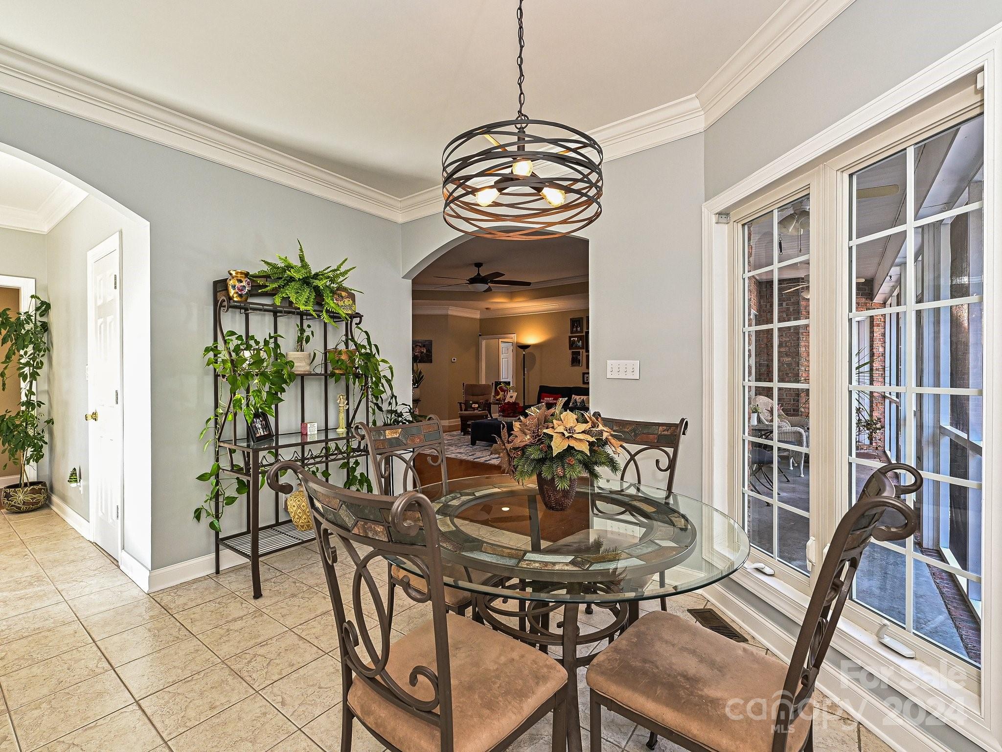 3203 Bentley Drive Lancaster, SC 29720 - Photo 19 of 45 a view of a dining room with furniture and chandelier