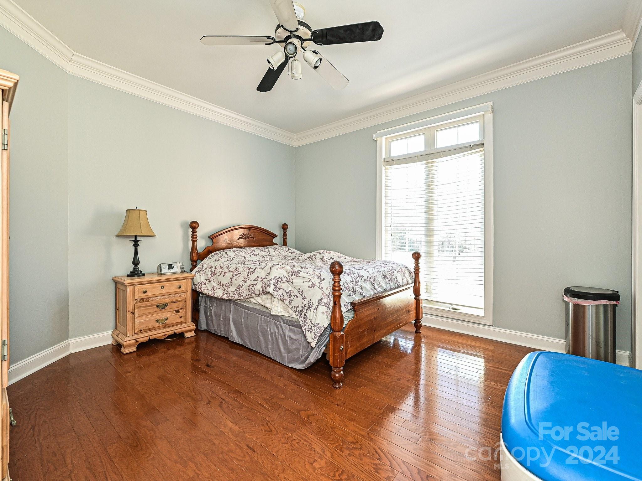 3203 Bentley Drive Lancaster, SC 29720 - Photo 29 of 45 a bedroom with a bed and wooden floor