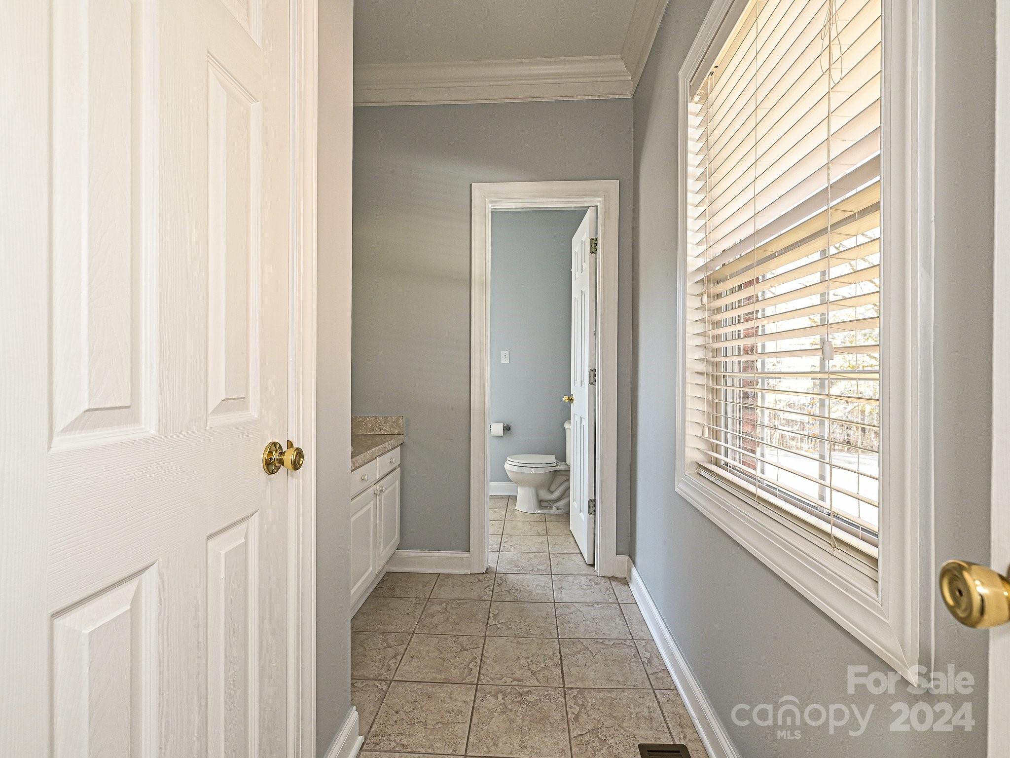 3203 Bentley Drive Lancaster, SC 29720 - Photo 33 of 45 a view of a hallway with windows