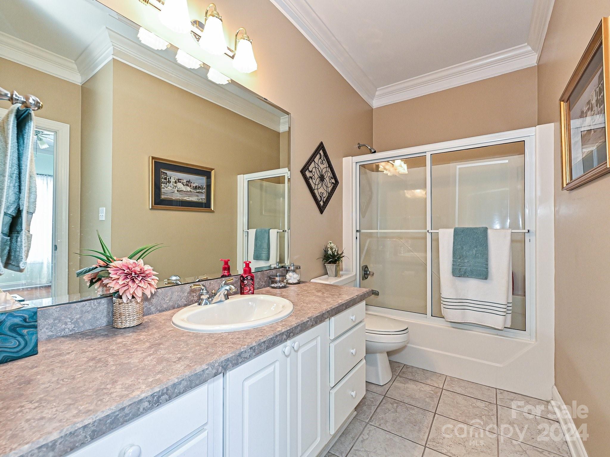 3203 Bentley Drive Lancaster, SC 29720 - Photo 36 of 45 a bathroom with a double vanity sink mirror and toilet