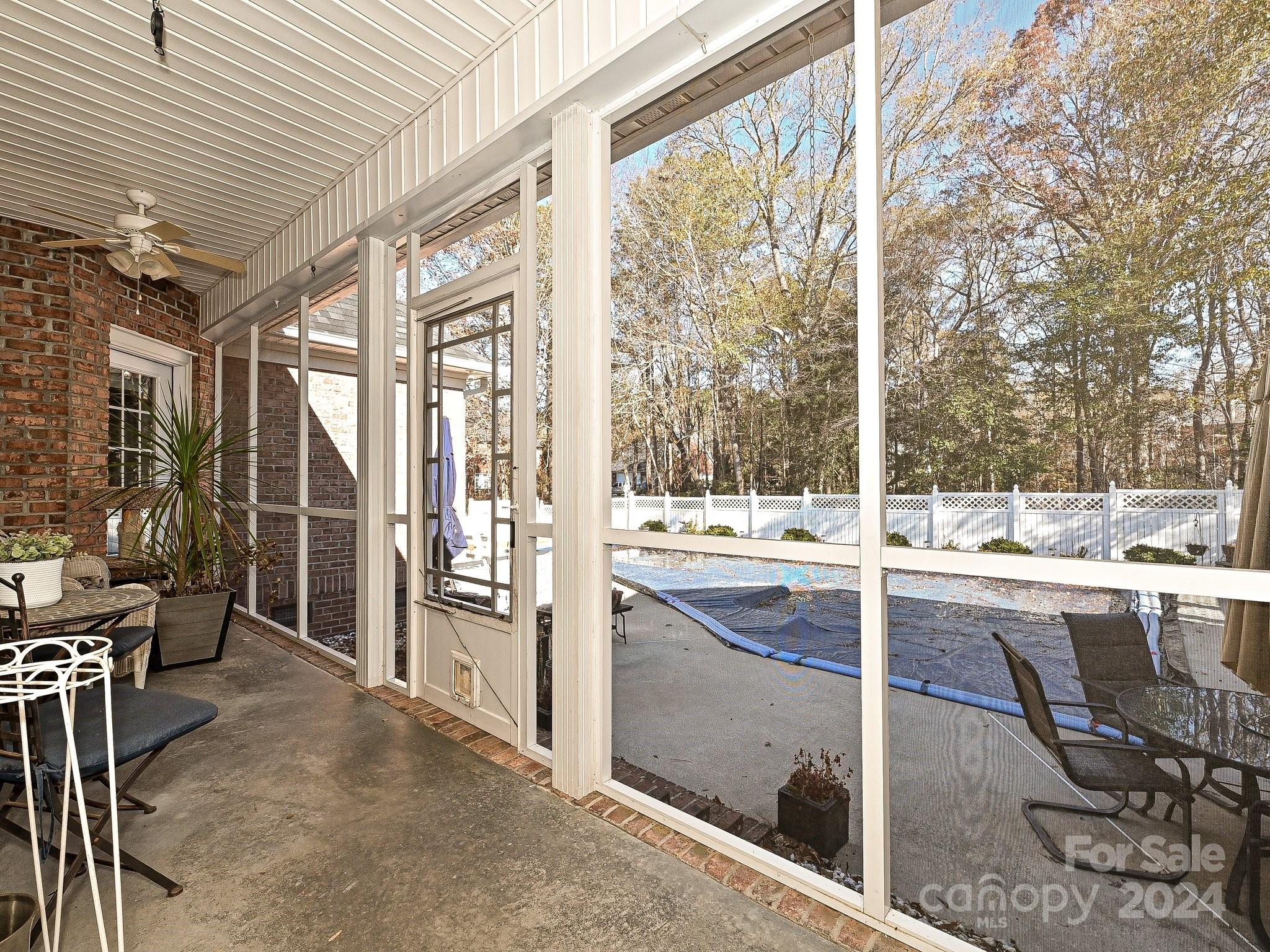 3203 Bentley Drive Lancaster, SC 29720 - Photo 38 of 45 a view of living room kitchen with furniture and large windows
