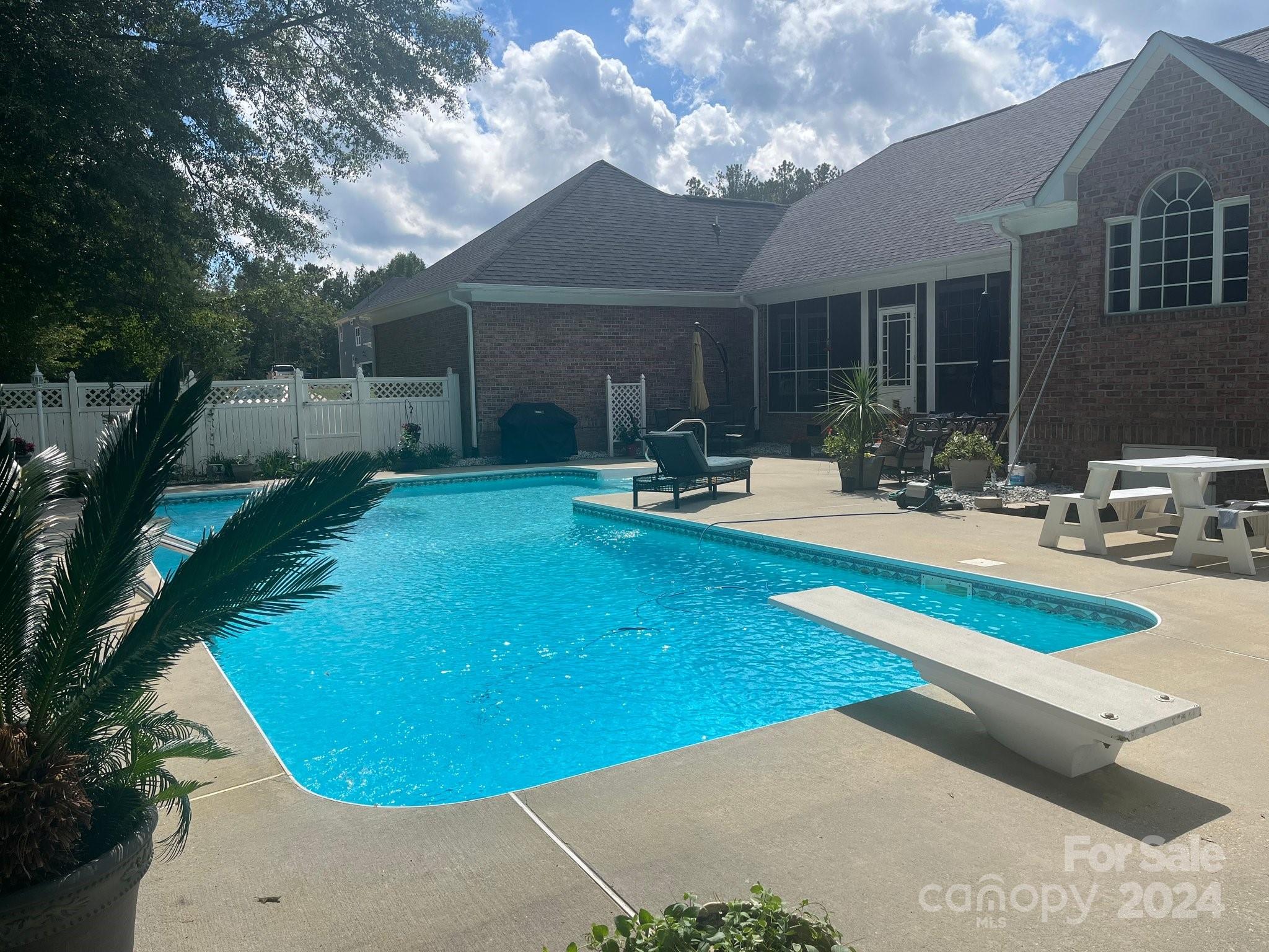 3203 Bentley Drive Lancaster, SC 29720 - Photo 40 of 45 a view of a house with swimming pool and sitting area