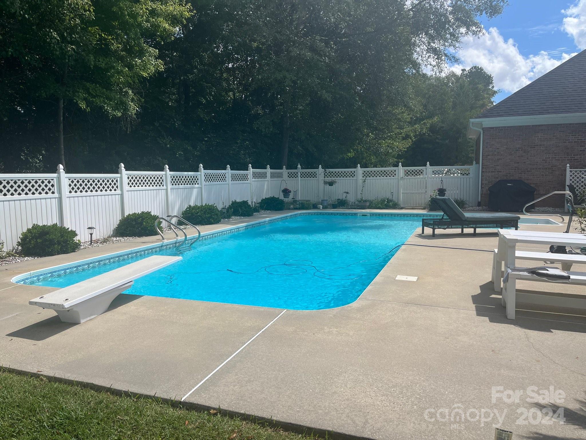 3203 Bentley Drive Lancaster, SC 29720 - Photo 44 of 45 a view of a swimming pool with a yard