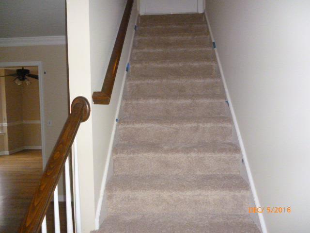 1225 Hortense Road Dickson, TN 37055 - Photo 4 of 14 Stairs to upper level, over 1200 SF that could easily be finished.
