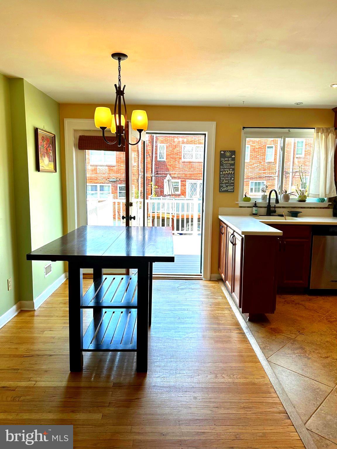 5444 Quentin Street Philadelphia, PA 19128 - Photo 8 of 22 Airlite-large windows and doors on back wall.