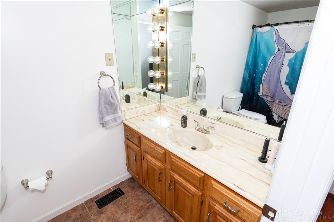 728 Chipplegate Drive Centerville, OH 45459 - Photo 22 of 30 This bright bathroom features a spacious vanity with an integrated sink and ample storage.