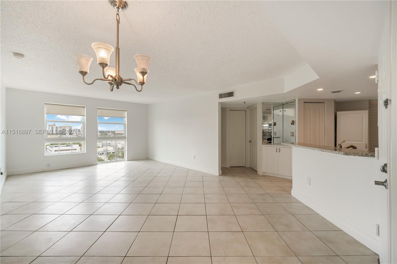 2351 Douglas Road, Unit 1207 Miami, FL 33145 - Photo 2 of 22 a view of an empty room and window