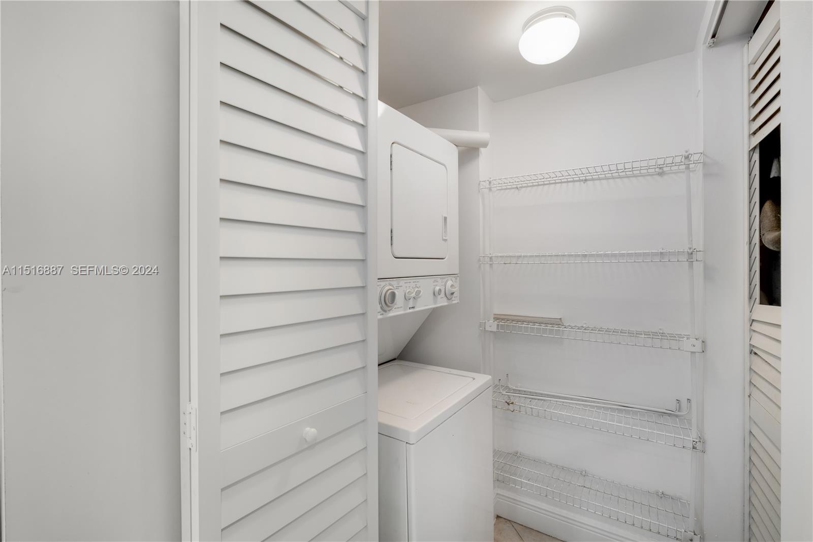 2351 Douglas Road, Unit 1207 Miami, FL 33145 - Photo 8 of 22 a view of walk in closet