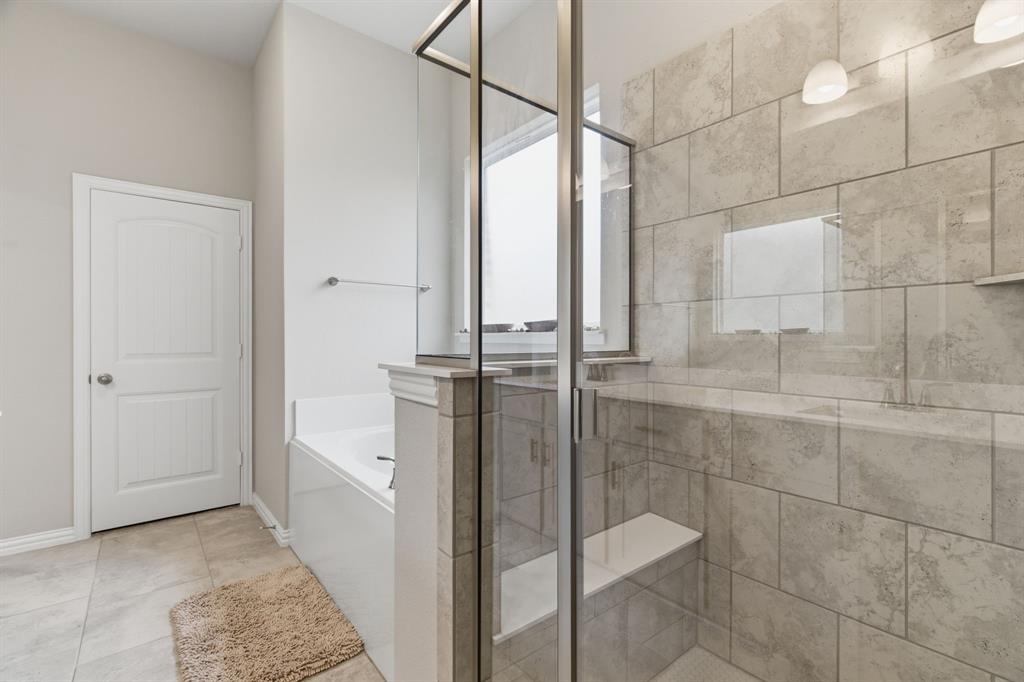 1117 Springfield Road Springtown, TX 76082 - Photo 22 of 40 a bathroom with a granite countertop shower and a sink