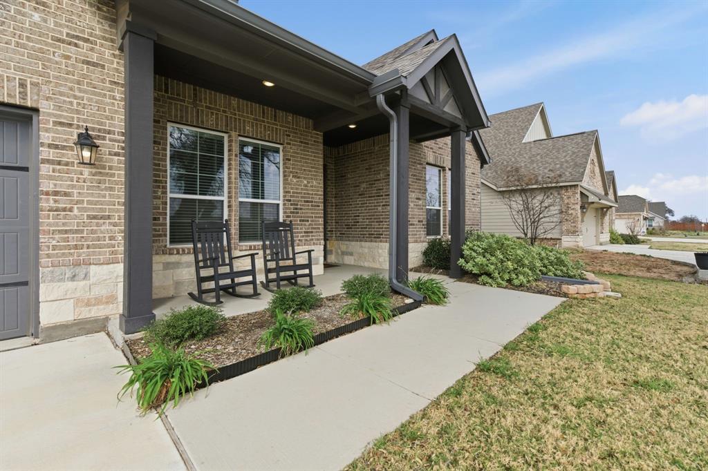 1117 Springfield Road Springtown, TX 76082 - Photo 3 of 40 front view of house with a yard