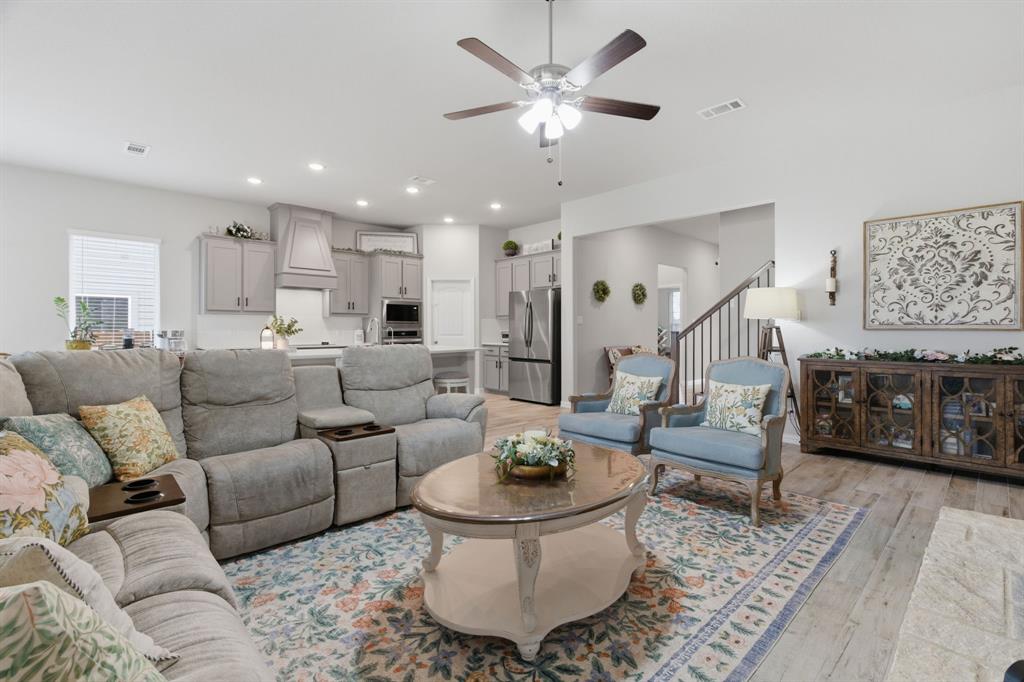 1117 Springfield Road Springtown, TX 76082 - Photo 8 of 40 a living room with furniture and a rug