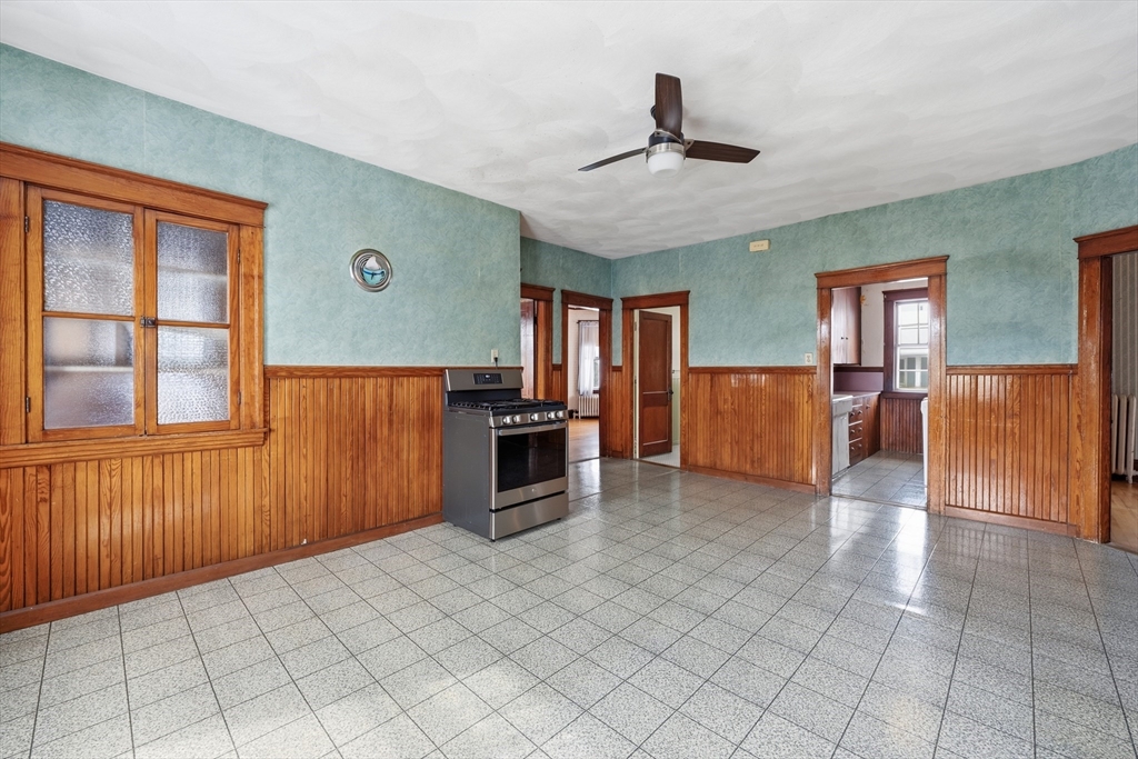 47 Houghton Street Worcester, MA 01604 - Photo 28 of 39 a view of a kitchen with furniture wooden floor and window
