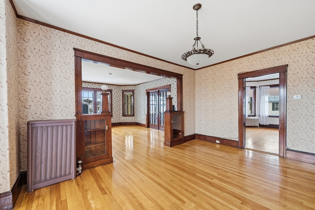 47 Houghton Street Worcester, MA 01604 - Photo 36 of 39 a view of a livingroom with wooden floor and stairs
