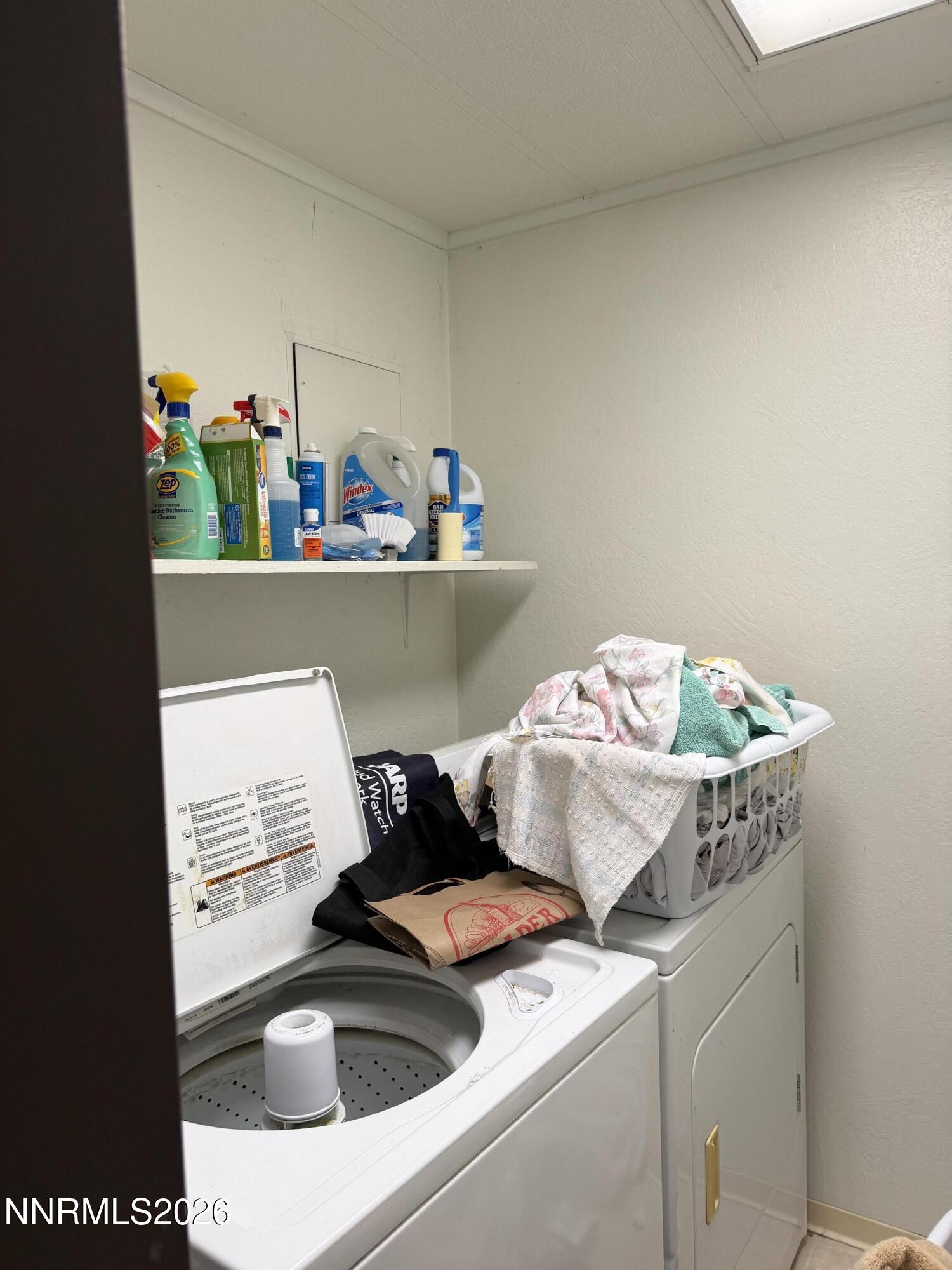 6 Ketten Road Tonopah, NV 89049 - Photo 26 of 49 a utility room with dryer and washer