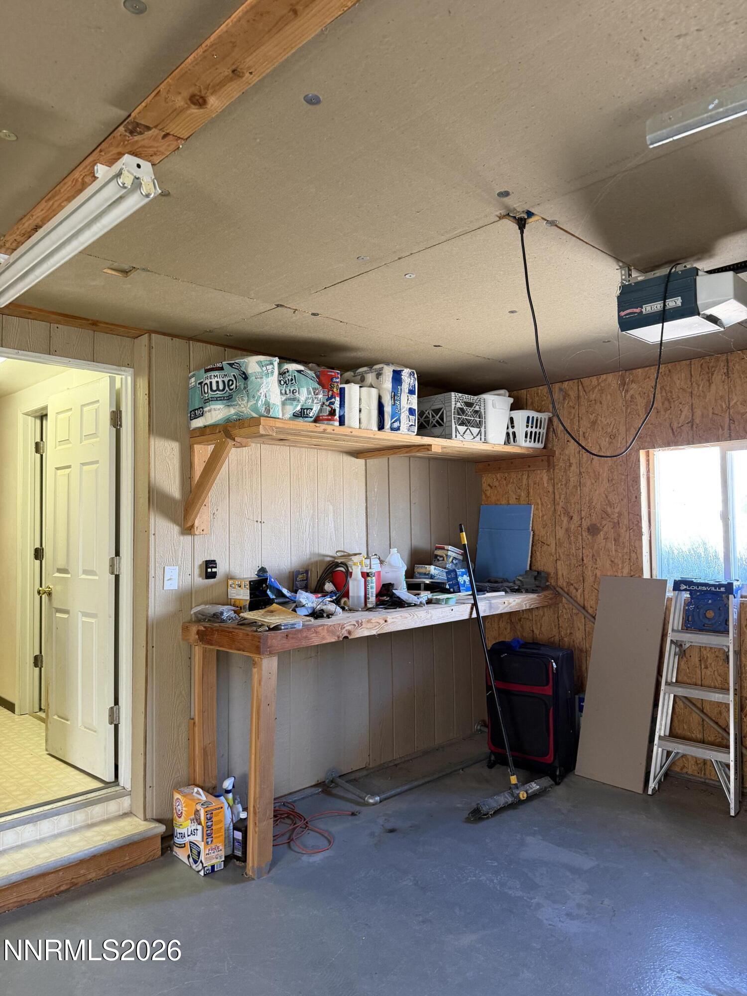 6 Ketten Road Tonopah, NV 89049 - Photo 30 of 49 a room with wooden furniture and a window