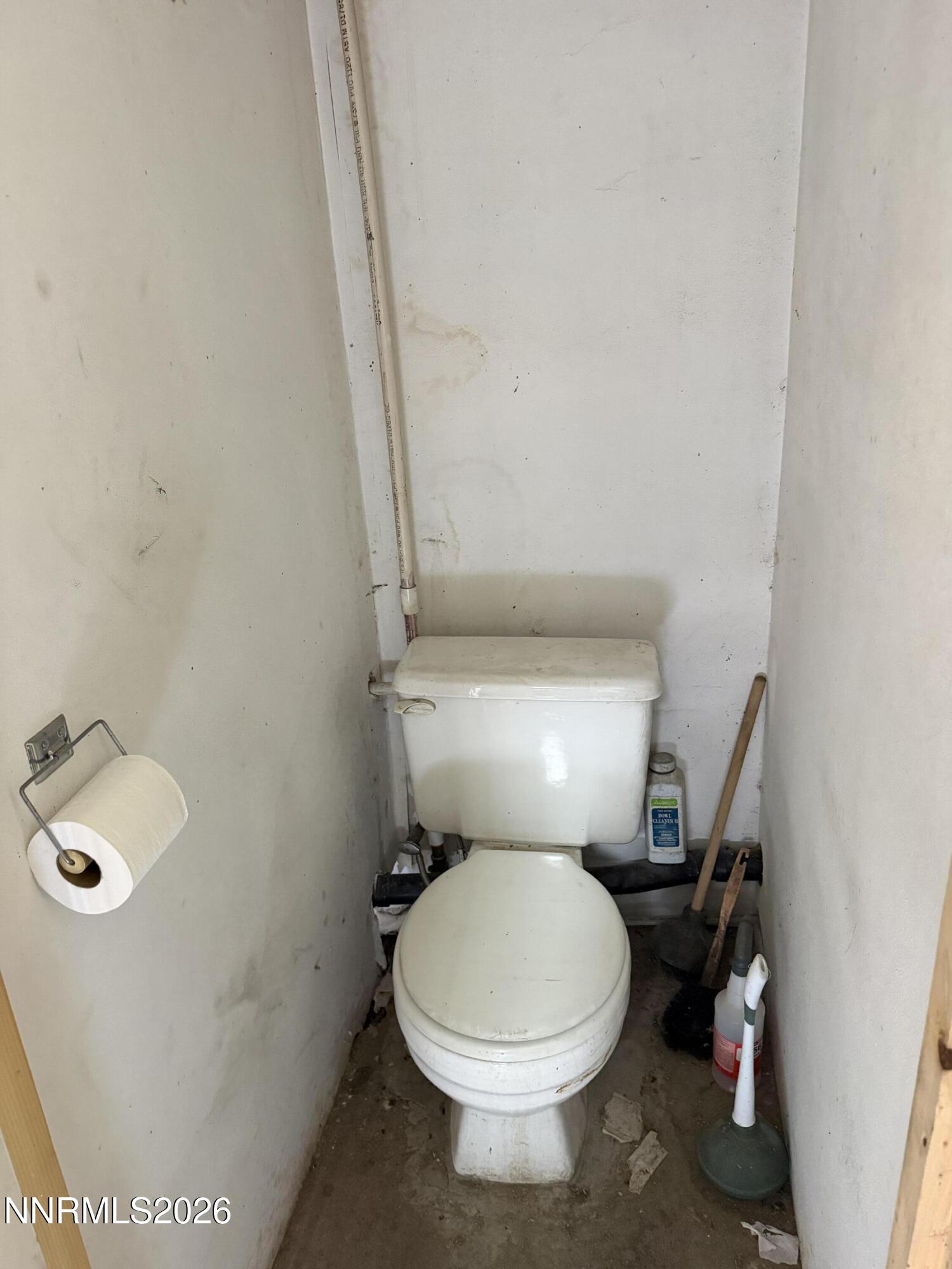 6 Ketten Road Tonopah, NV 89049 - Photo 42 of 49 a white toilet sitting next to a sink