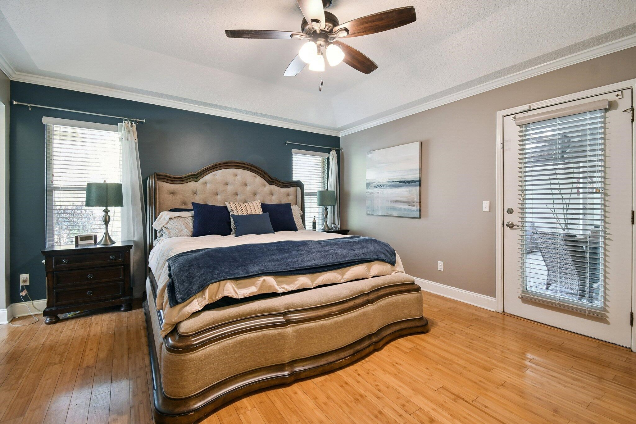 1220 Creek Bend Road Jacksonville, FL 32259 - Photo 13 of 30 a bedroom with a bed and wooden floor