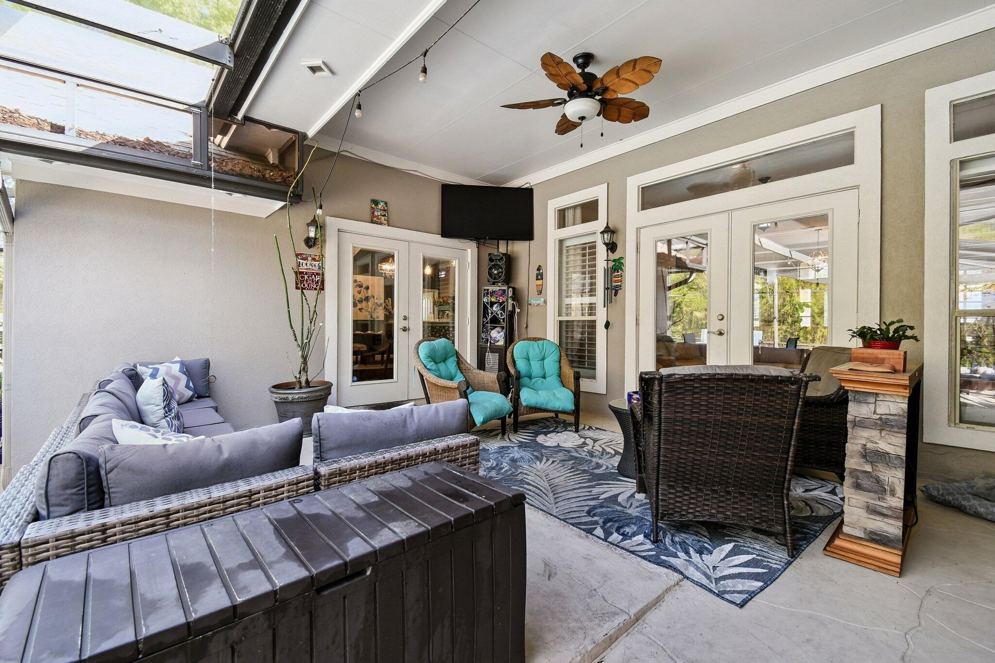 1220 Creek Bend Road Jacksonville, FL 32259 - Photo 24 of 30 View of patio featuring french doors, a ceiling fan, and an outdoor hangout area