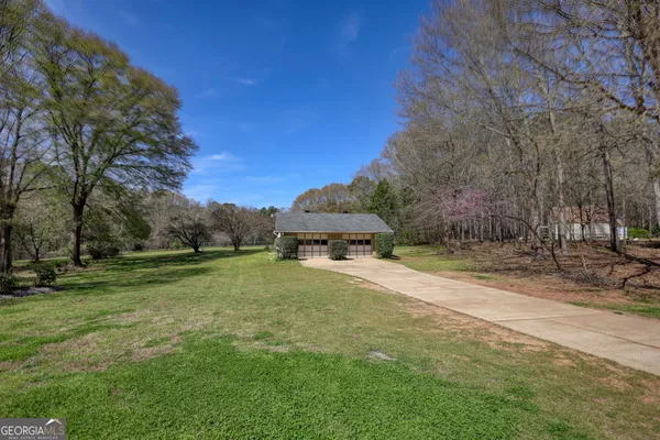 $585,000 | 2744 Highway 212, Conyers, GA 30094