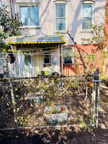 a view of a street with cars