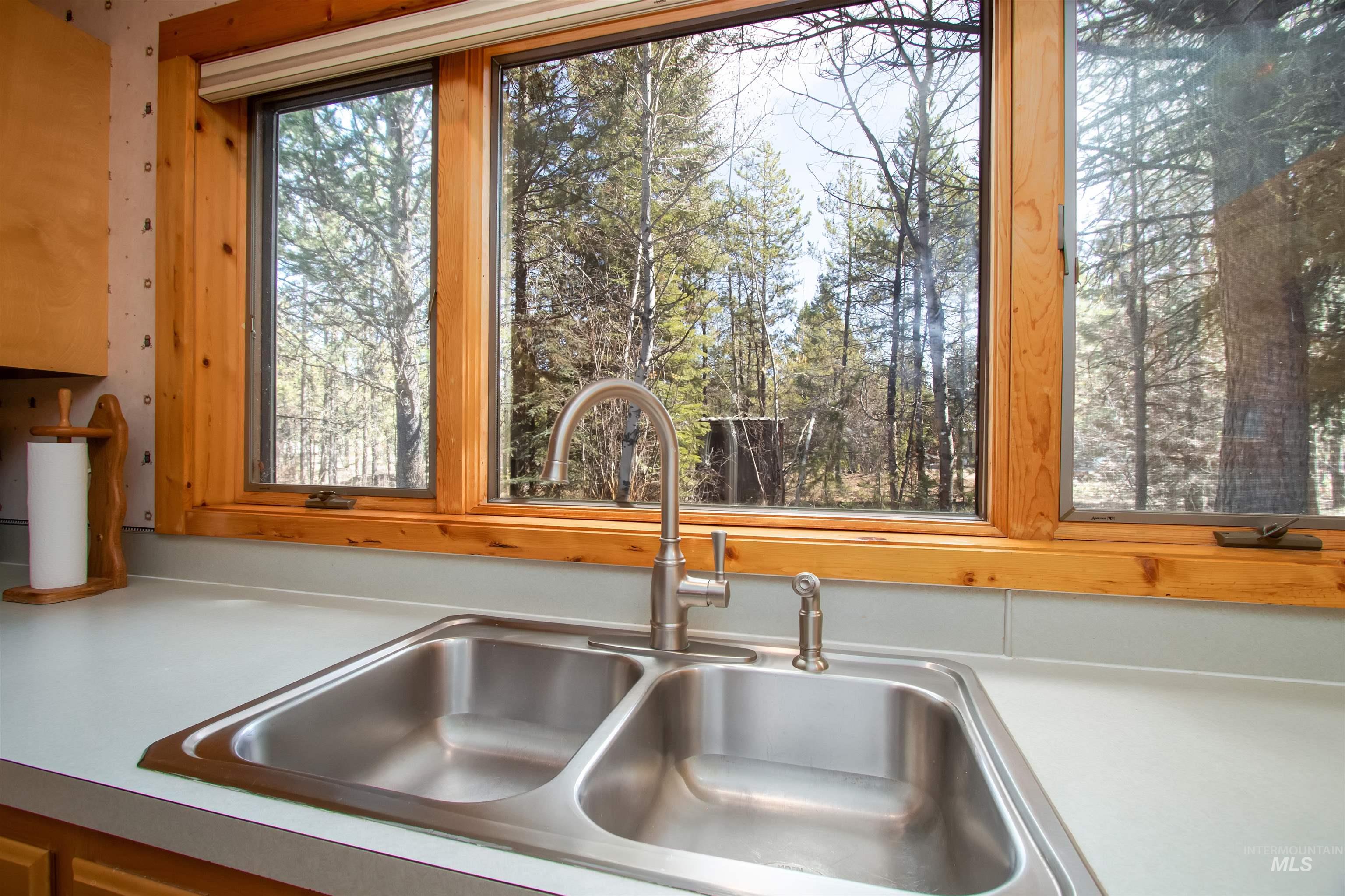 12712 Hereford Road Donnelly, ID 83615 - Photo 14 of 50 Kitchen view of a sink and light countertops