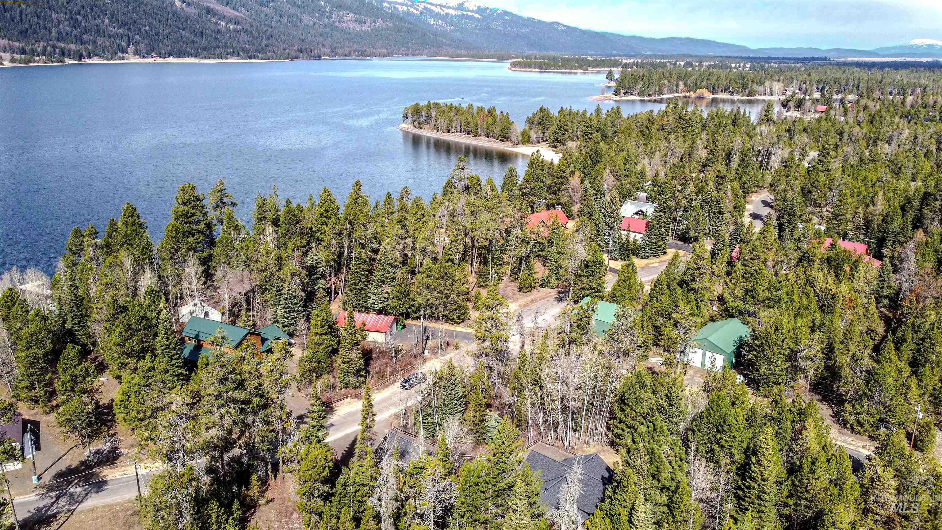 12712 Hereford Road Donnelly, ID 83615 - Photo 8 of 50 Bird's eye view of a water and mountain view and a heavily wooded area