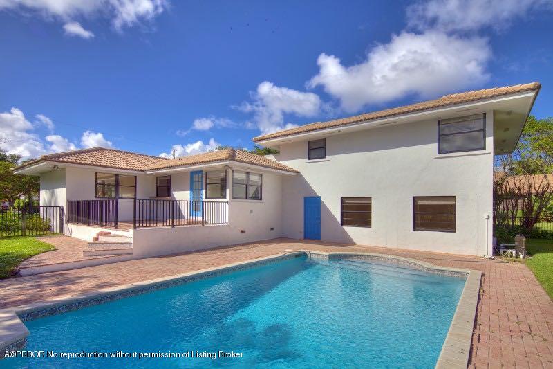 314 Beach Curve Road Lantana, FL 33462 - Photo 2 of 21 2 Pool & Back Exterior