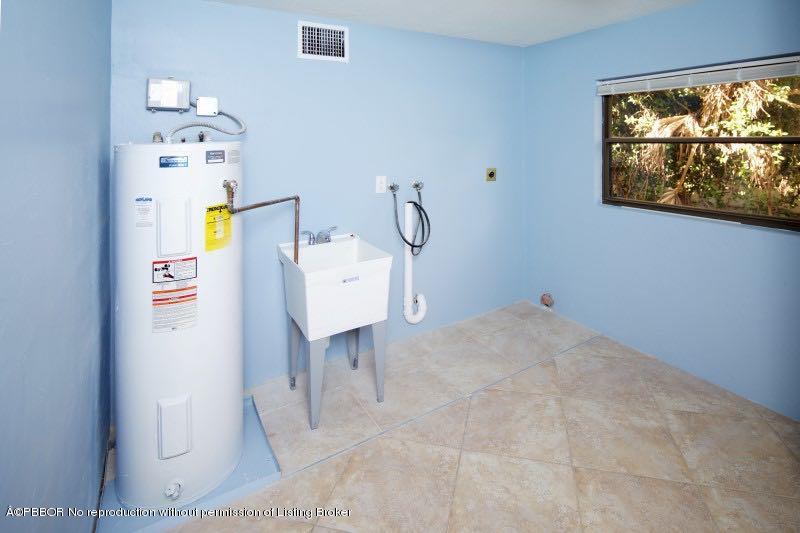 314 Beach Curve Road Lantana, FL 33462 - Photo 18 of 21 17 Utility Room