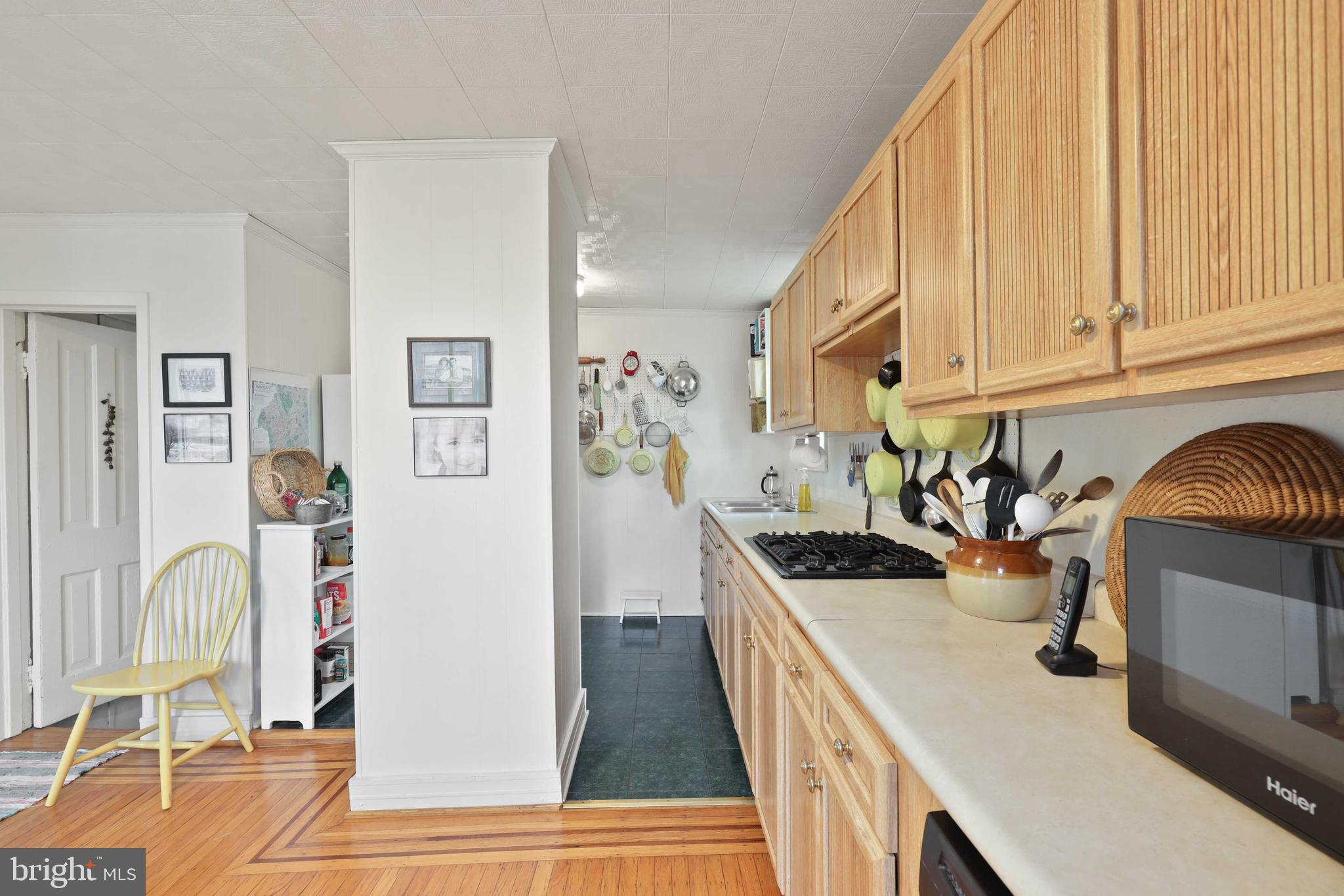 4507 Wilmslow Road Baltimore, MD 21210 - Photo 16 of 59 Kitchen floor with oak flooring and walnut banding