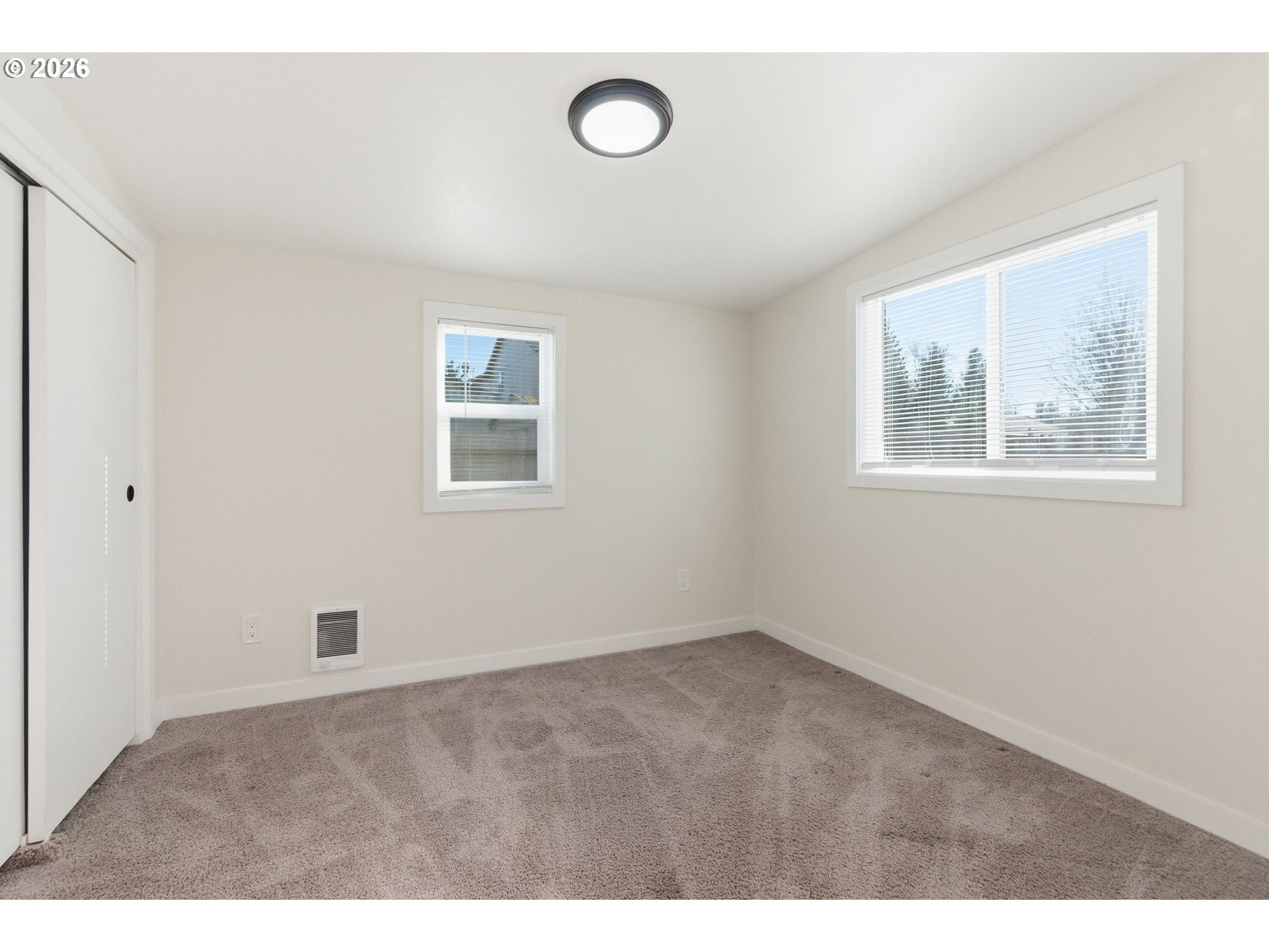 16484 Front Avenue Oregon City, OR 97045 - Photo 18 of 34 a view of an empty room with a window
