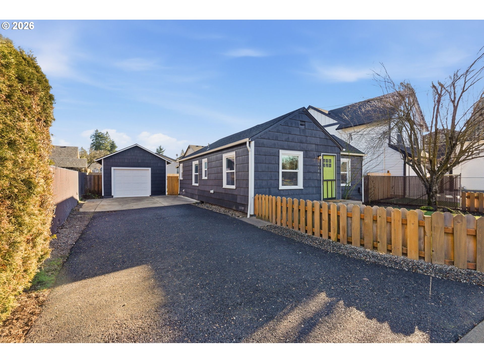 16484 Front Avenue Oregon City, OR 97045 - Photo 3 of 34 a view of a house with a yard