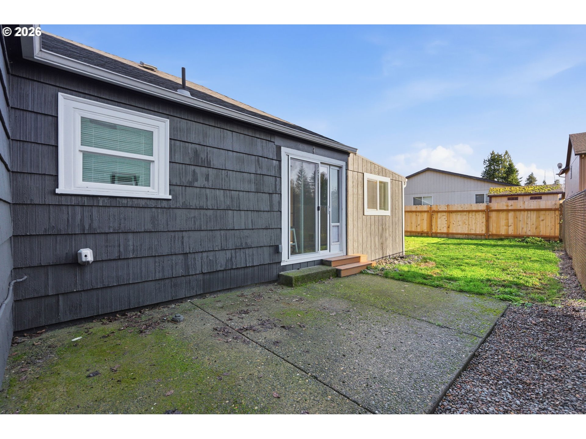 16484 Front Avenue Oregon City, OR 97045 - Photo 32 of 34 a view of a house with a yard