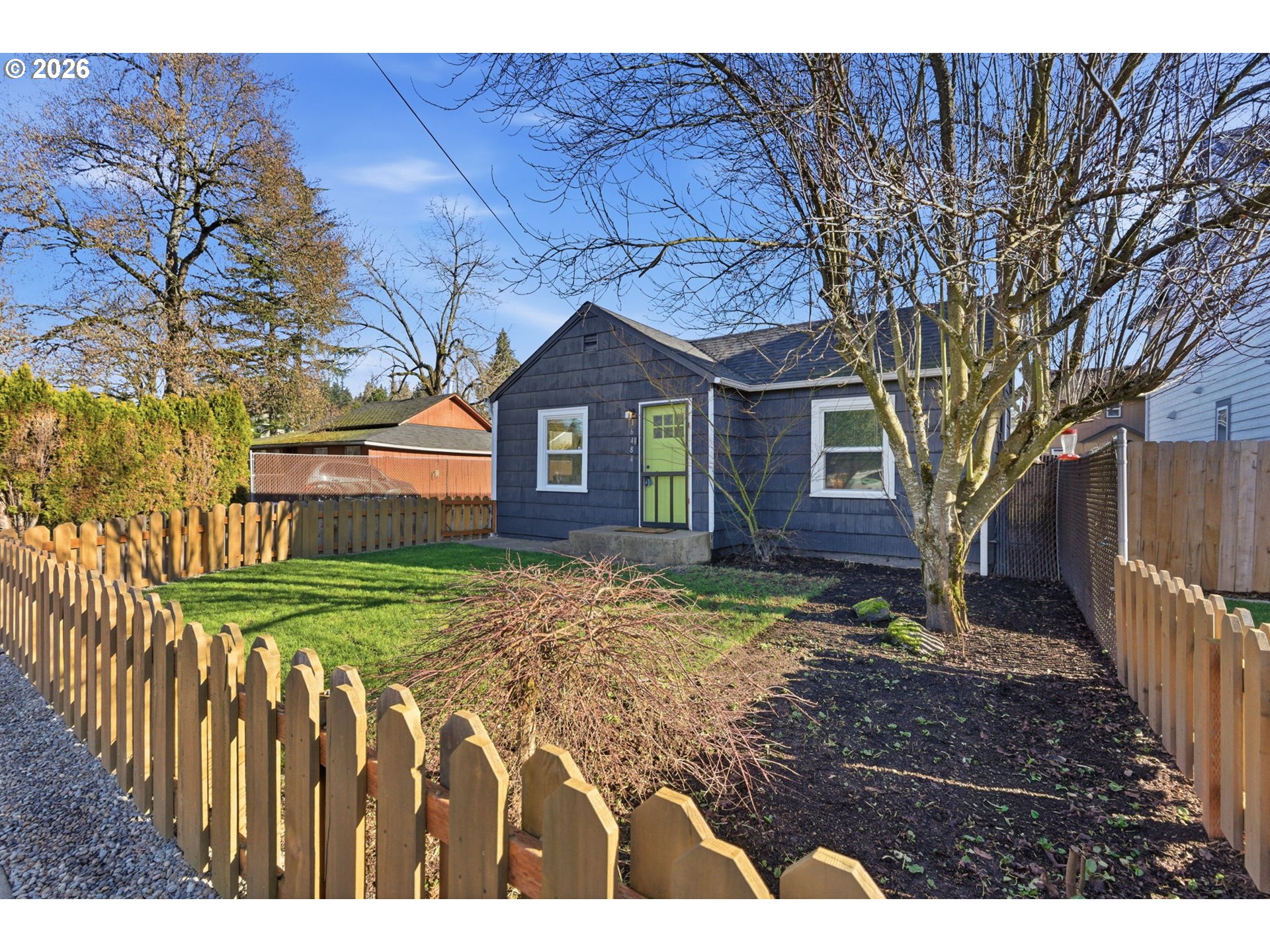 16484 Front Avenue Oregon City, OR 97045 - Photo 33 of 34 a front view of a house with a yard