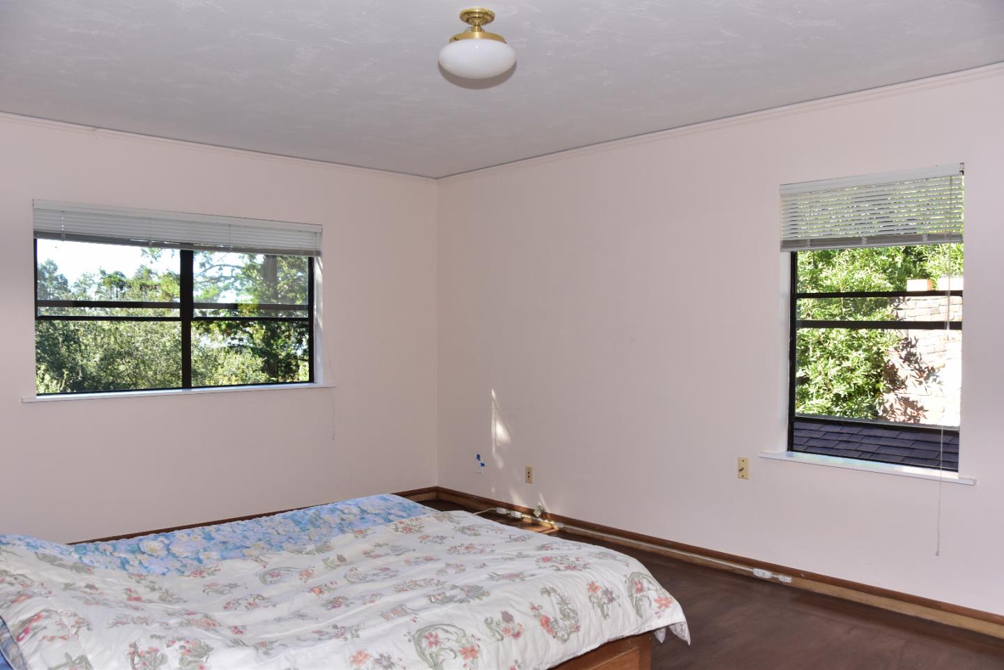 66 Poppy Lane Berkeley, CA 94708 - Photo 18 of 38 a bedroom with a bed window and mirror