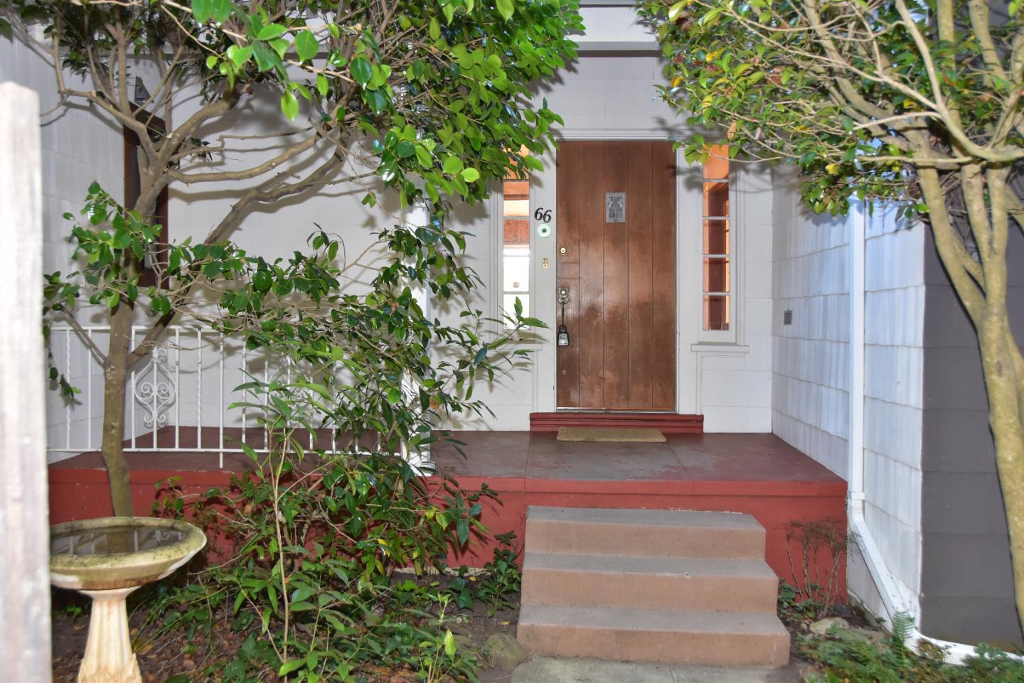 66 Poppy Lane Berkeley, CA 94708 - Photo 2 of 38 a front view of a house with a yard