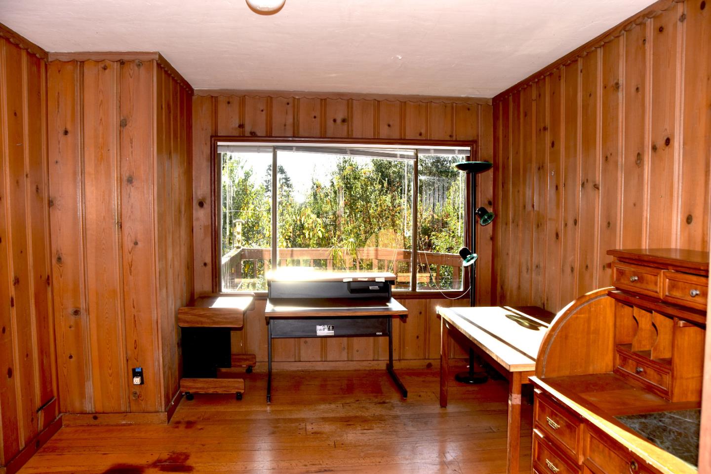 66 Poppy Lane Berkeley, CA 94708 - Photo 9 of 38 a living room with furniture and a window