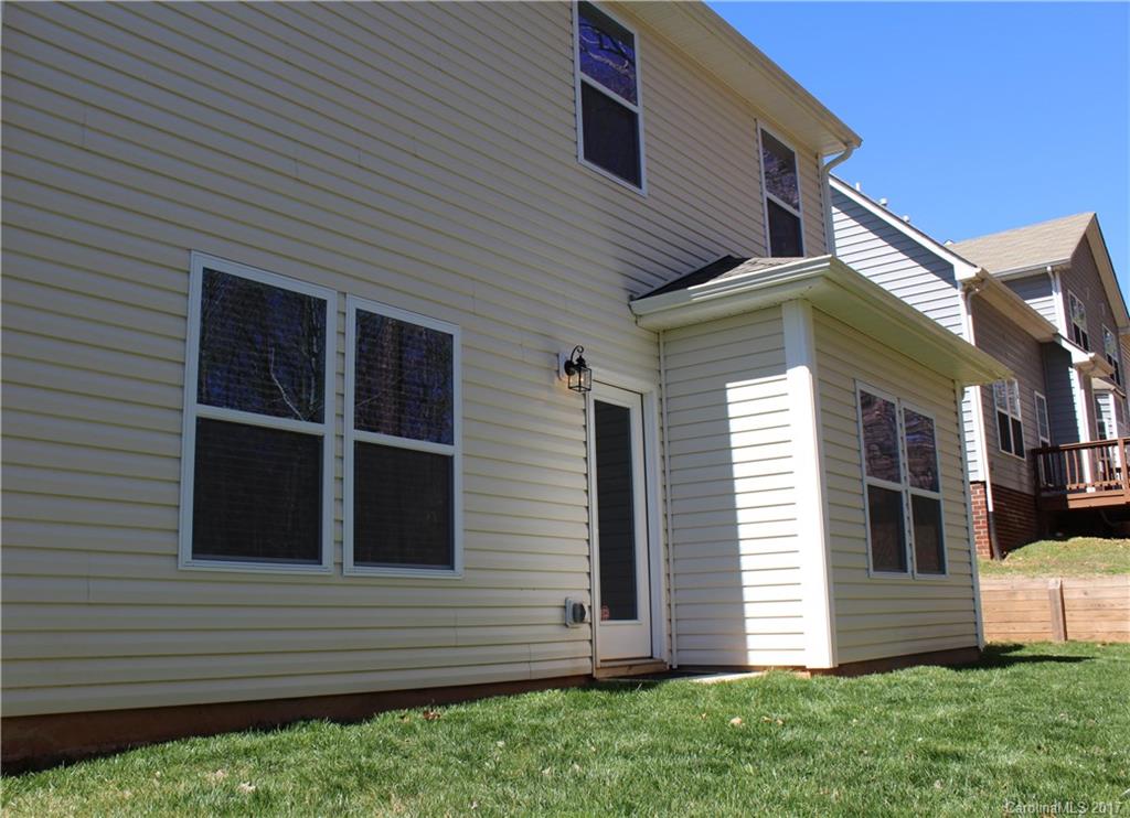 240 Mott Road Mooresville, NC 28115 - Photo 12 of 14 a view of a house with a yard