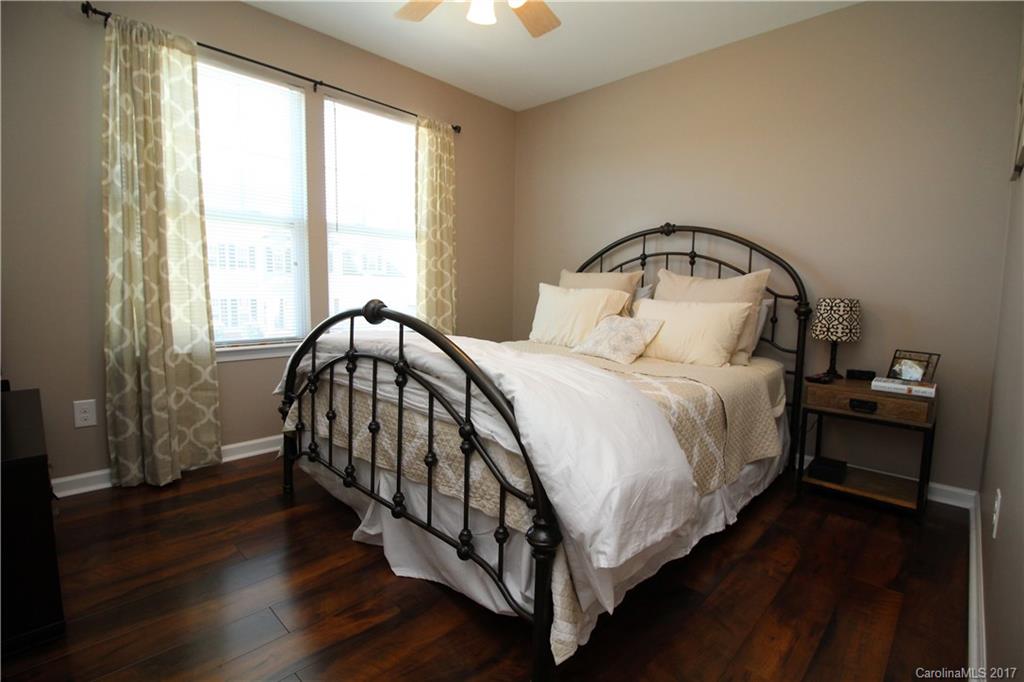 240 Mott Road Mooresville, NC 28115 - Photo 8 of 14 a bedroom with a bed and window