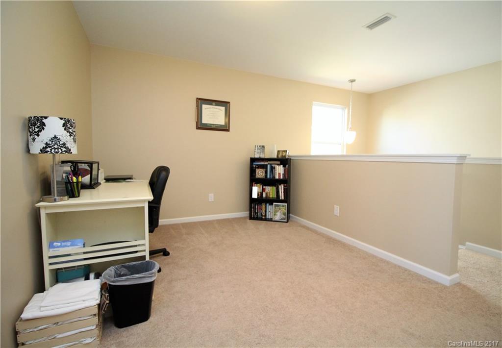 240 Mott Road Mooresville, NC 28115 - Photo 10 of 14 a view of workspace with furniture and window