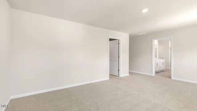 an empty room with an entryway