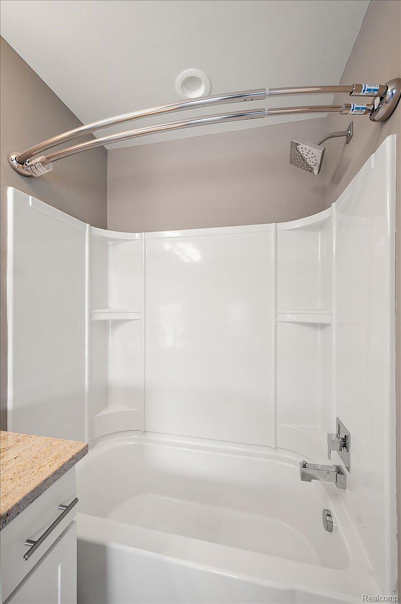 2877 Hartwick Drive Rochester, MI 48307 - Photo 31 of 44 Full bathroom featuring bathtub / shower combination and vanity