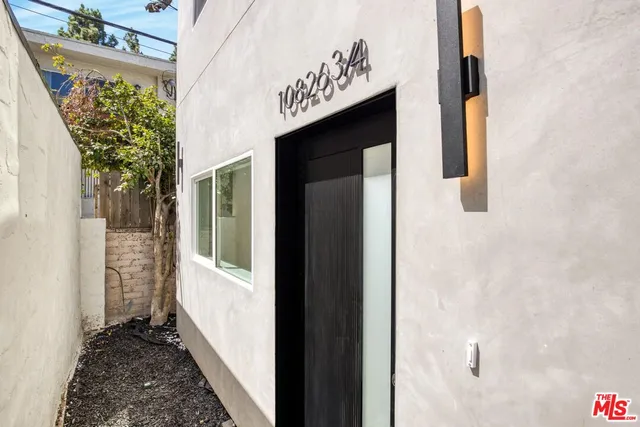 a view of a door and an outdoor space