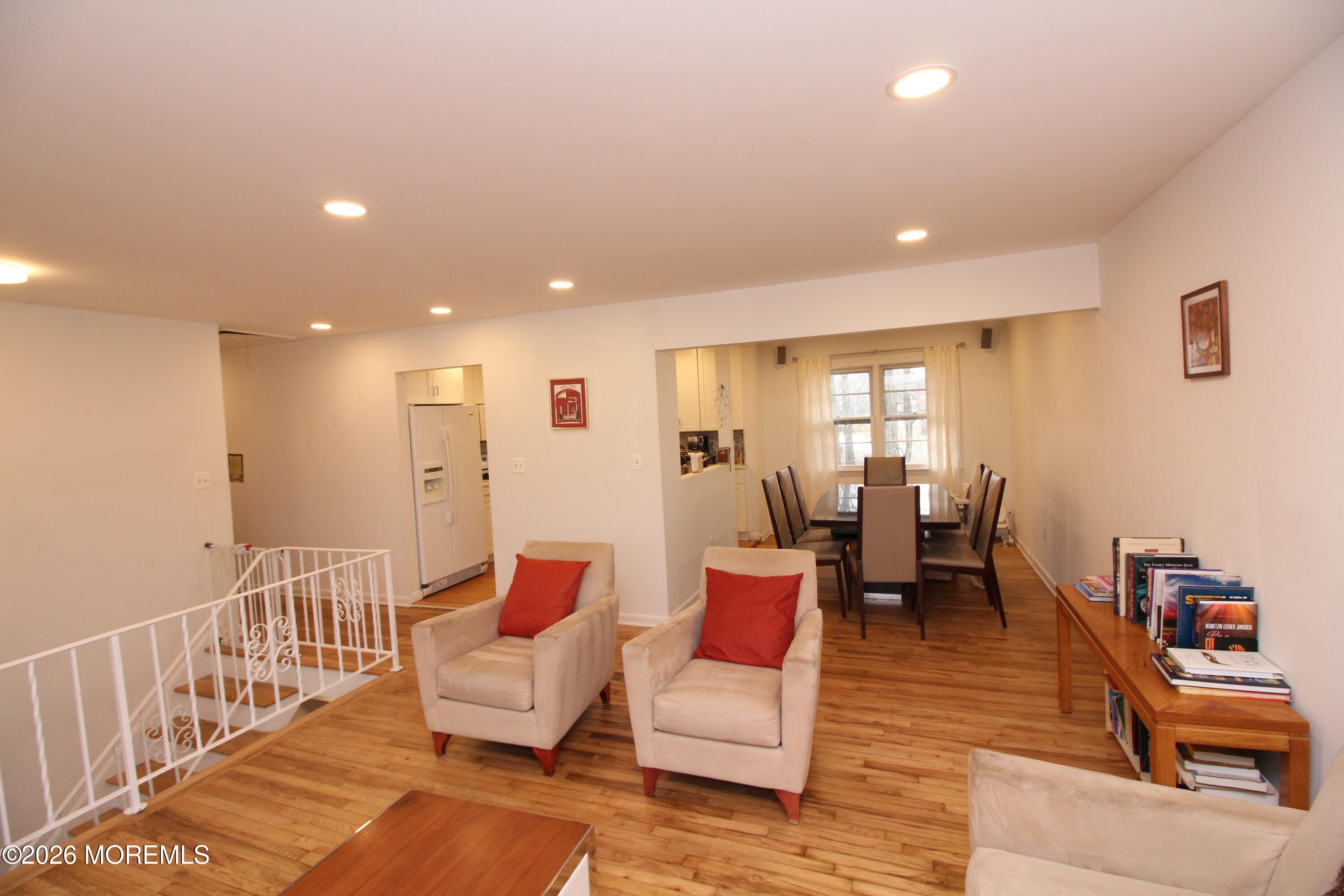 7 Portsmouth Road Englishtown, NJ 07726 - Photo 11 of 29 a living room with furniture and wooden floor