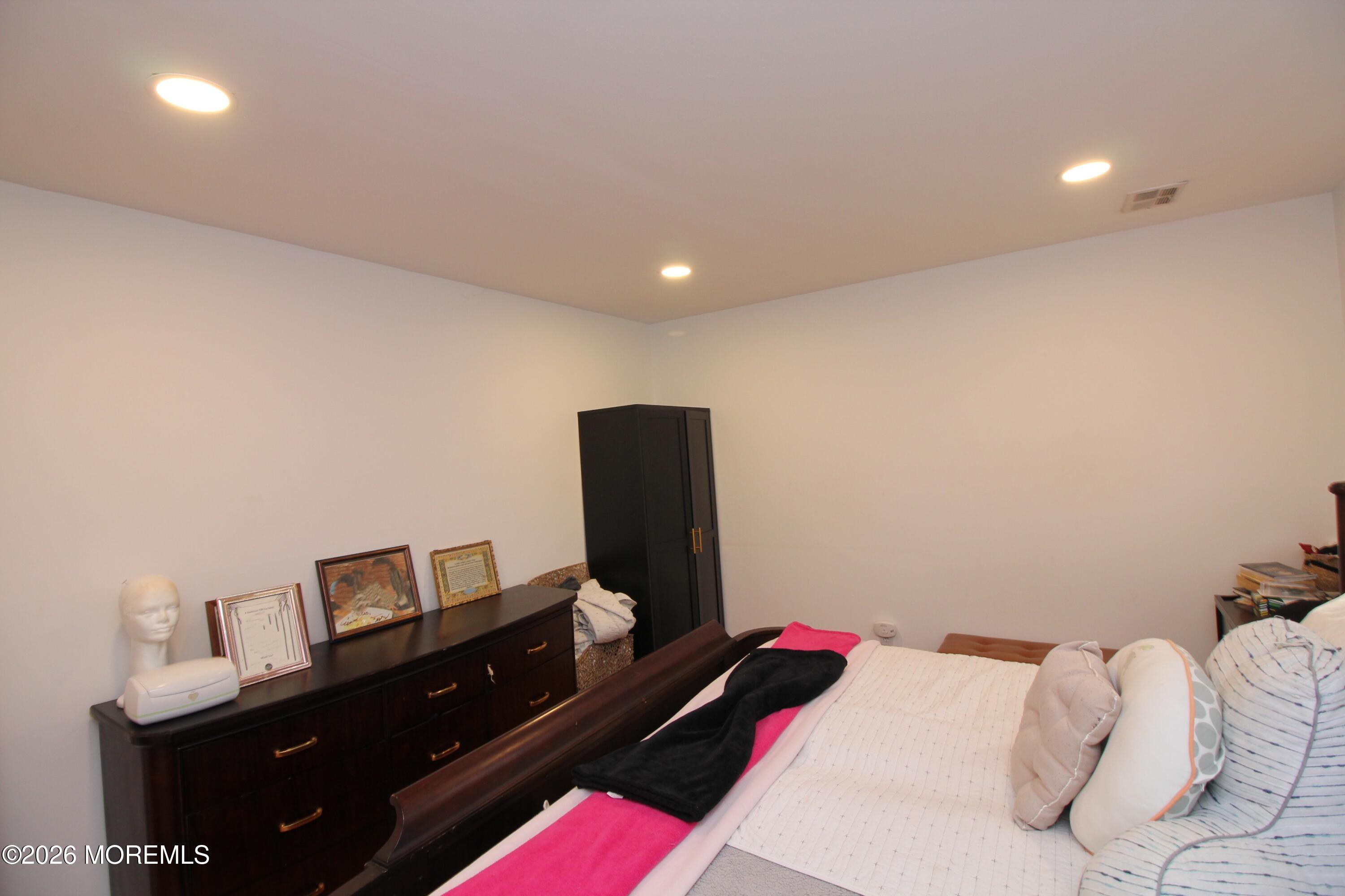 7 Portsmouth Road Englishtown, NJ 07726 - Photo 18 of 29 a bedroom with a bed and a desk