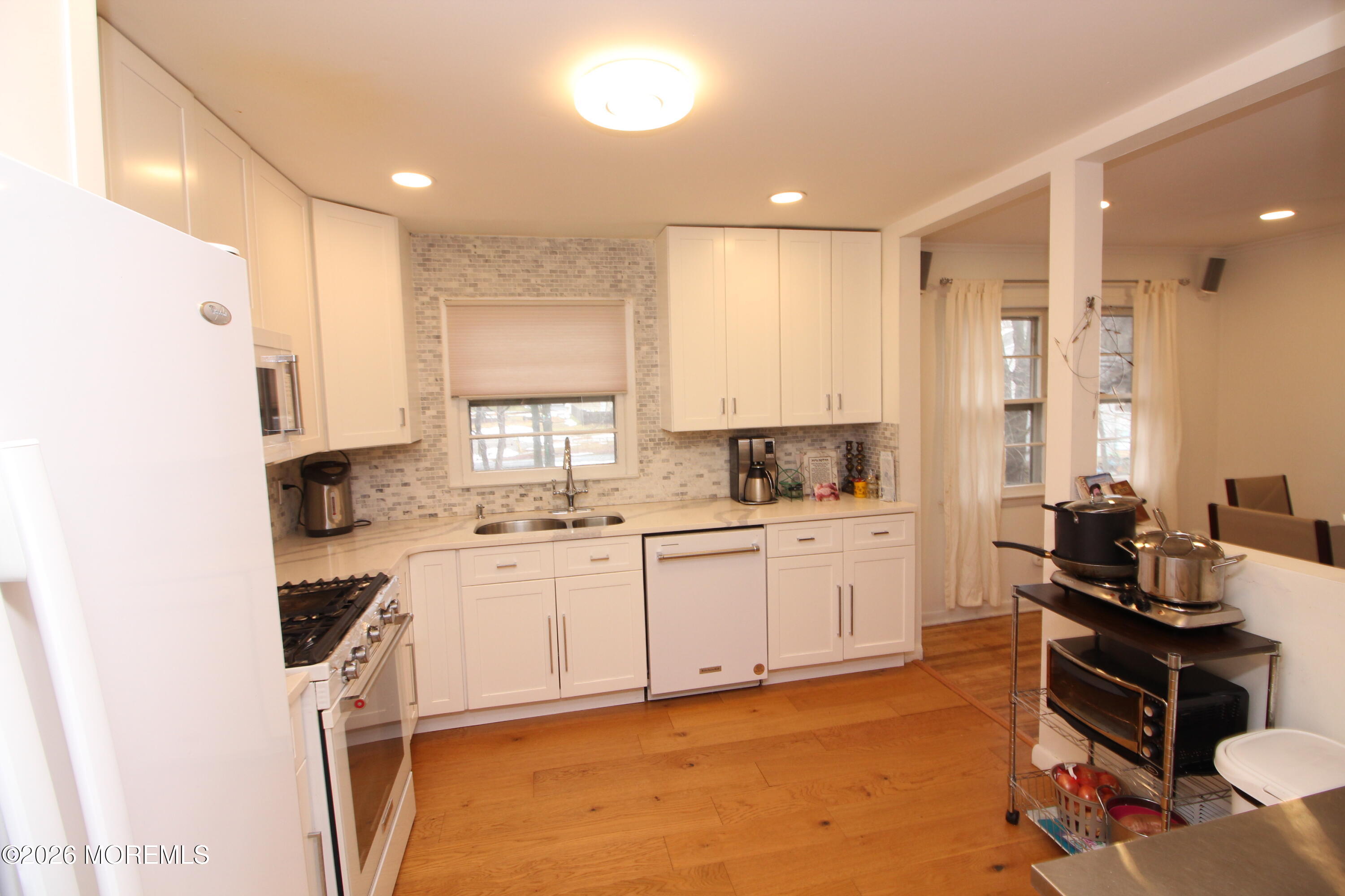7 Portsmouth Road Englishtown, NJ 07726 - Photo 5 of 29 a kitchen with a sink cabinets and window