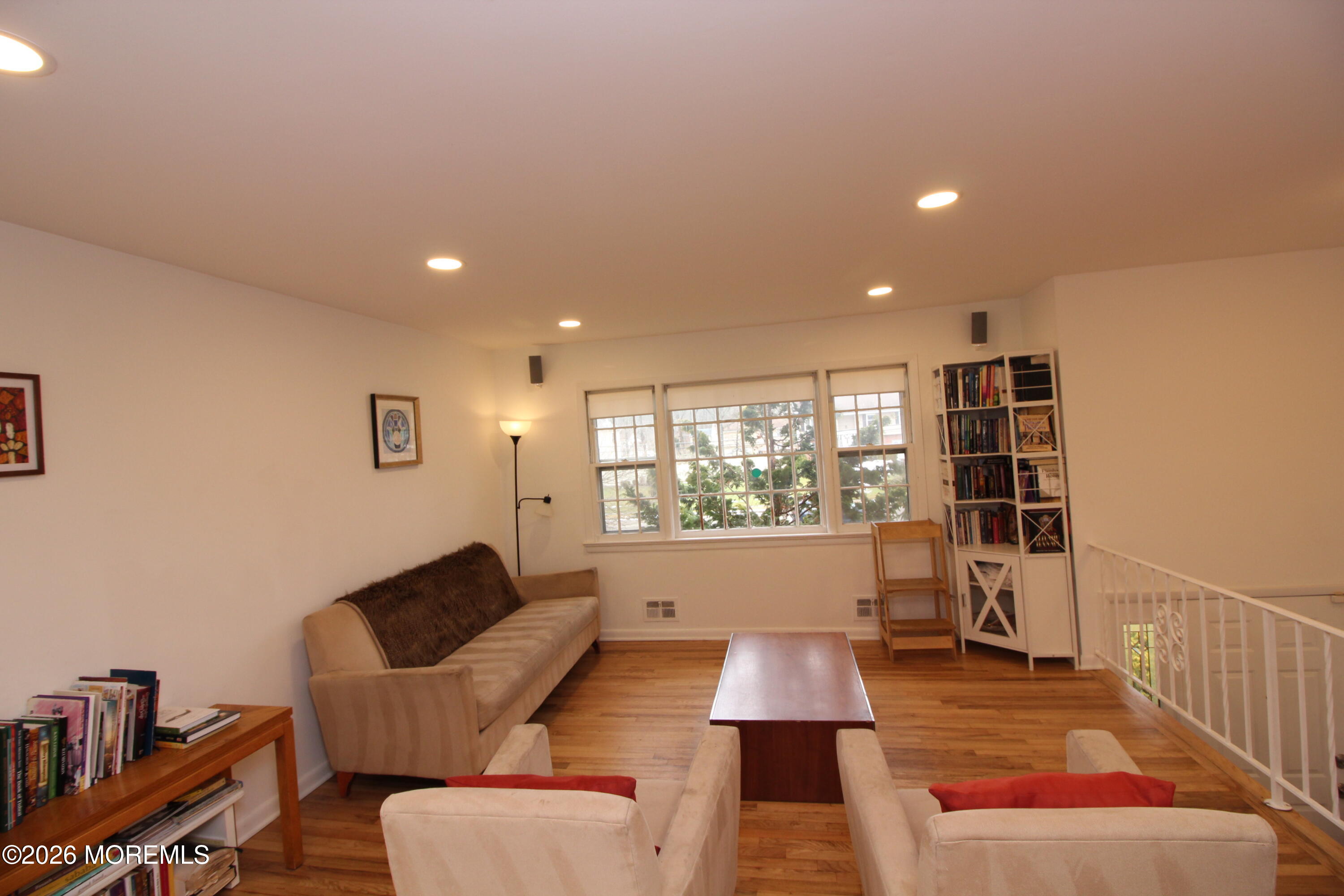 7 Portsmouth Road Englishtown, NJ 07726 - Photo 9 of 29 a living room with furniture and a large window