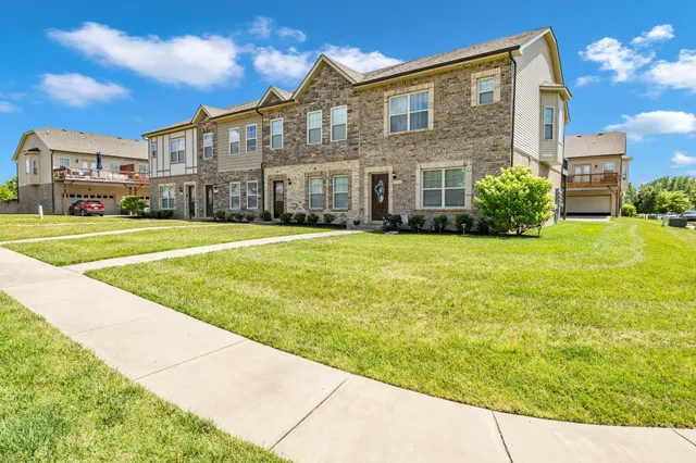 a view of building with yard