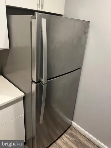 a close up of a stove top oven sitting inside of a kitchen