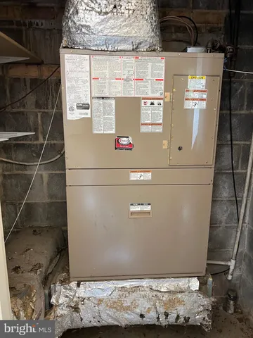 a view of a car parked on the side of a street